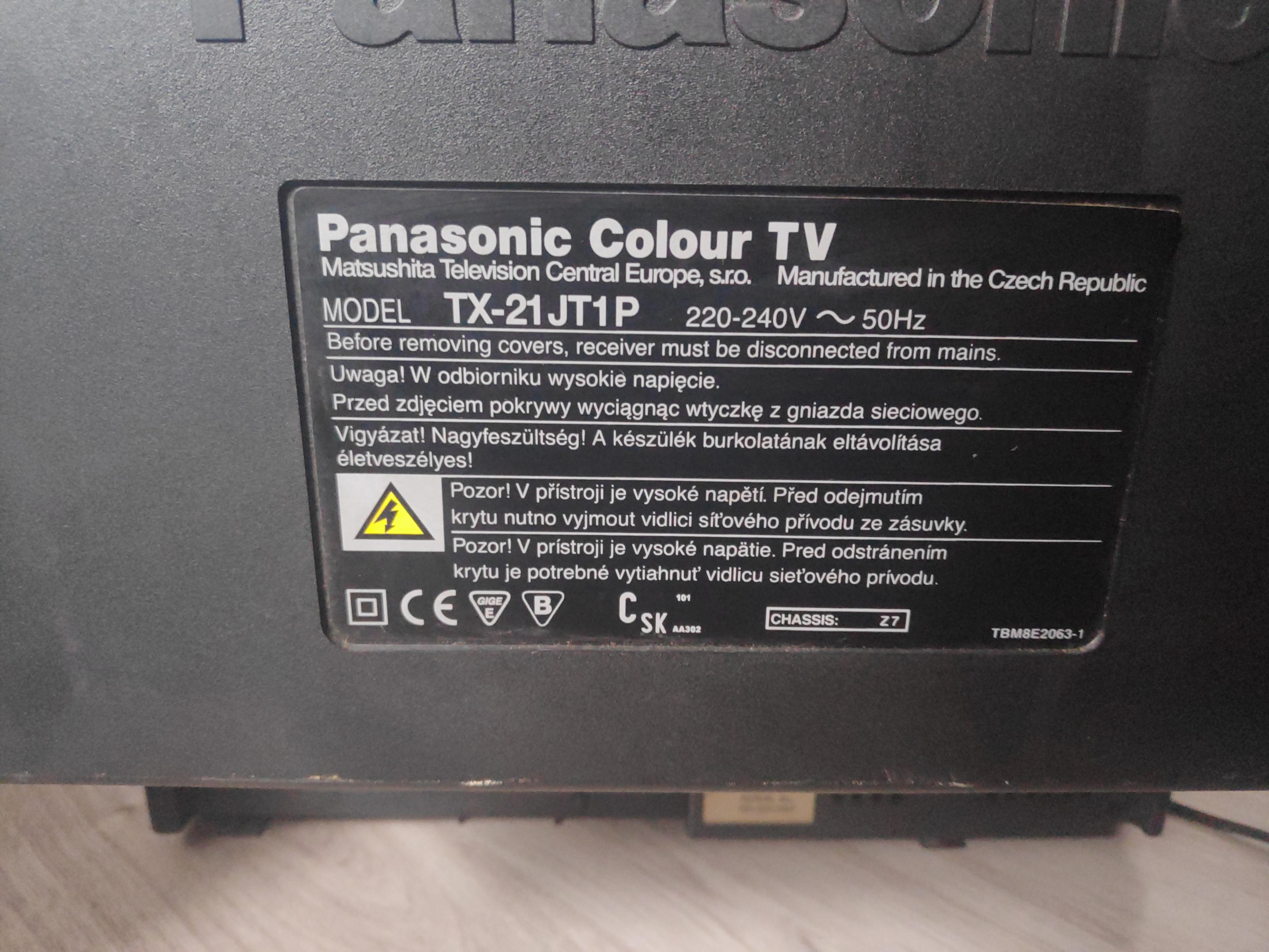 The back of the TV reads (wrote it by hand, so there probably will be some mistakes, lol):
Matsushita Television Central Europe, s.r.o.
Manufactured in the Czech Republic

MODEL TX-21 JT1P    220-240 V  ~  50Hz
Before removing covers, reciver must be disconected from mains.

Uwaga! W odbiorniku wysokie napięcie.
Przed zdjęciem pokrywy wyciągnąć wtyczkę z gniazda sieciowego.

Vigyázat! Nagyfeszültség! A készülék burkolarának eltávoltiása életveszélyes!

(I don't have the czech letters on my keyboardn :c)

Pozor! V pristoji je vysoké napetí. Pred odejmutím krytu nutno vyjmout vidlici sít'ového prívodu ze zásuvky.

Pozor! V pristoji je vyskoé napätie. Pred odstránením krytu je potrebné vytiahnut' vidlicu siet'ového privodu.

Jesus that was hard, xd