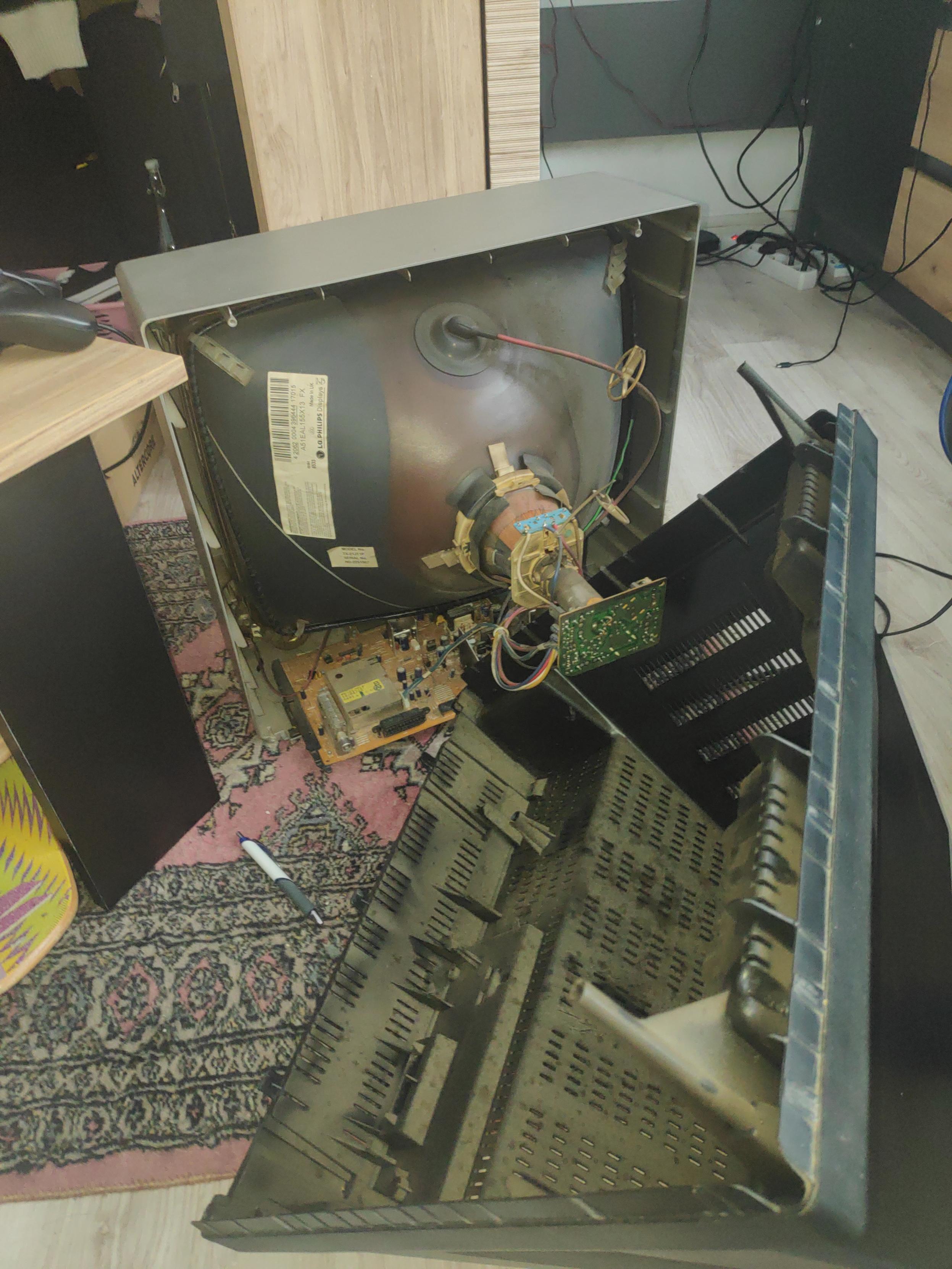 The inside of this old Panasonic TV. Kind of looks like a bomb.