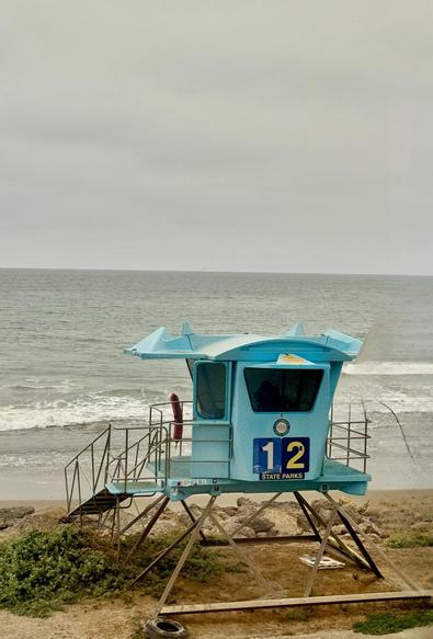 bright blue lifeguard station along the coast south of Santa Barbara