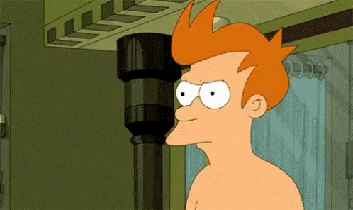 Fry from Futurama squinting and leaning forward