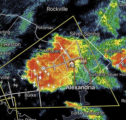 Radar image with a big blob of red orange and lightning bolts