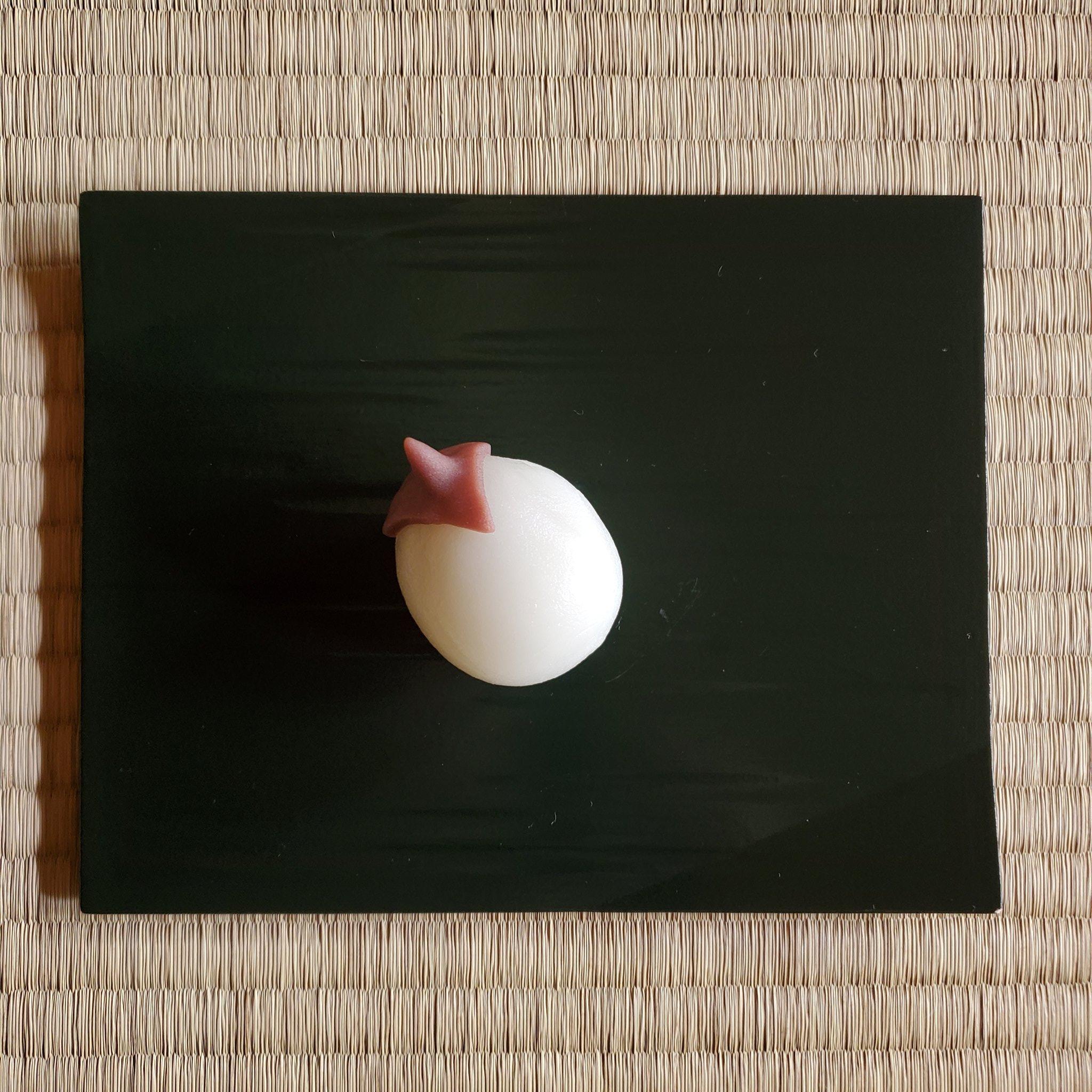 Toraya's white eggplant shaped 'nasubi-mochi'.