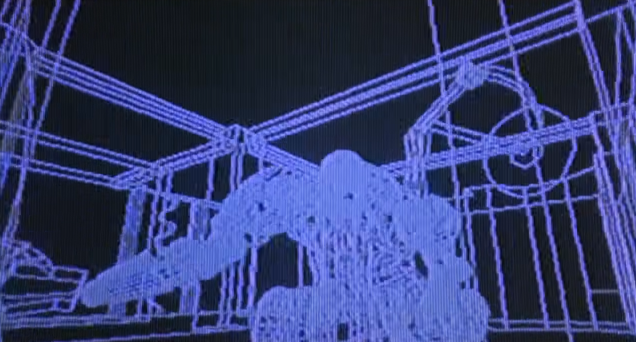 wireframe robot(?) creature in a wireframe structure.