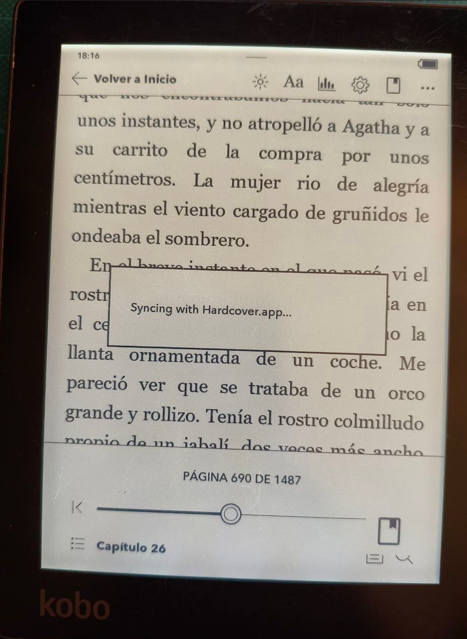 foto del ereader con el mismo libro y una ventanita que indica que está sincronizando con la página de antes.