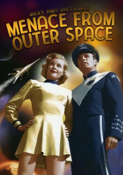 A movie poster featuring two individuals against a space background with the text "ROCKY JONES SPACE RANGER MENACE FROM OUTER SPACE" at the top. On the left, an individual with blonde hair wears a short, long-sleeved gold dress with black trim on the collar and cuffs. To the right, another individual is dressed in a dark blue uniform with white patches and a matching cap. The background consists of space, including planets, stars, and a small white spaceship trailing a streak of light across the scene.