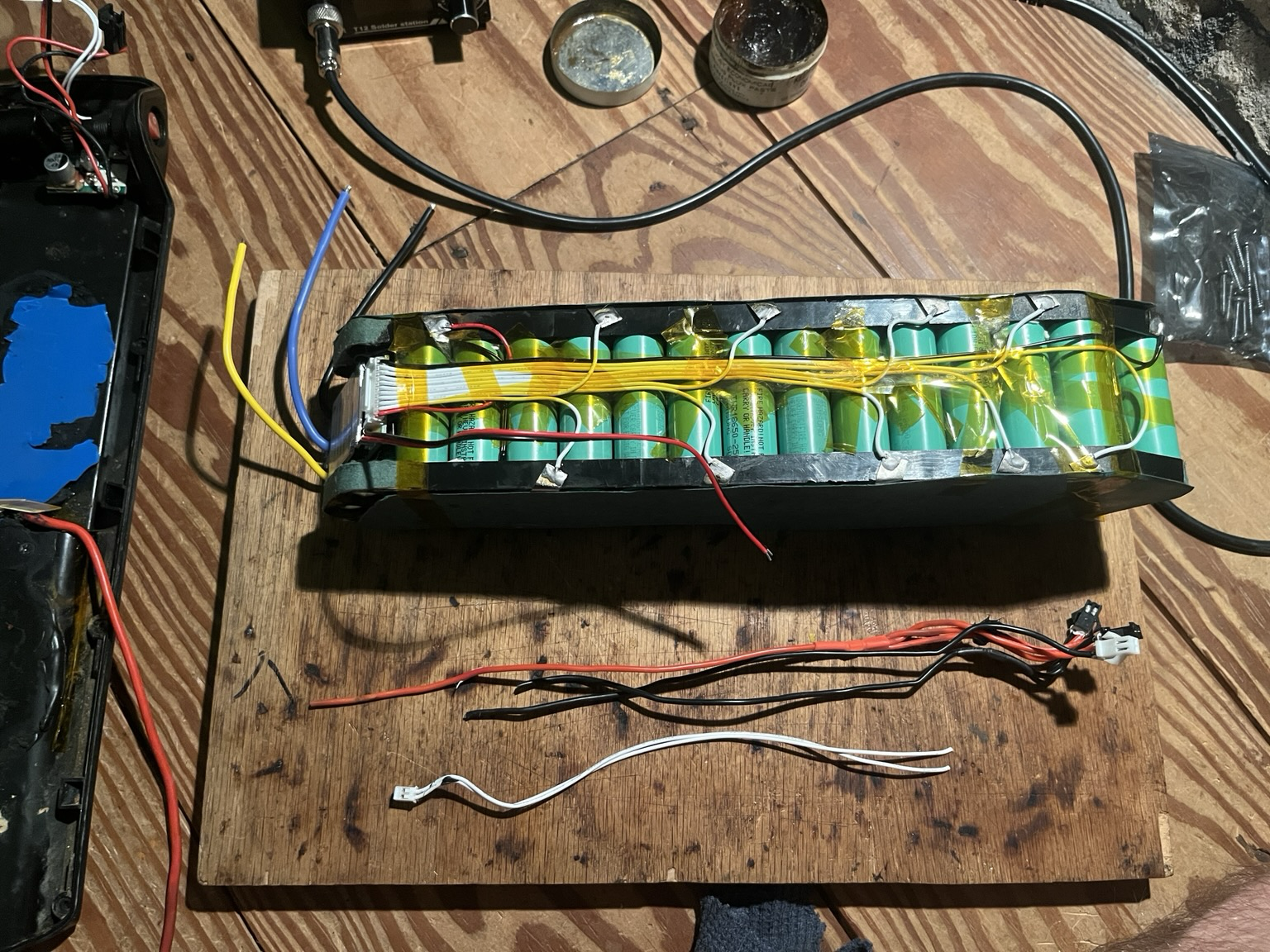 Battery pack with BMS attached at one end and leads soldered to the 10 groups