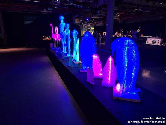 a couple of large lego sculptures that are illuminated from the inside