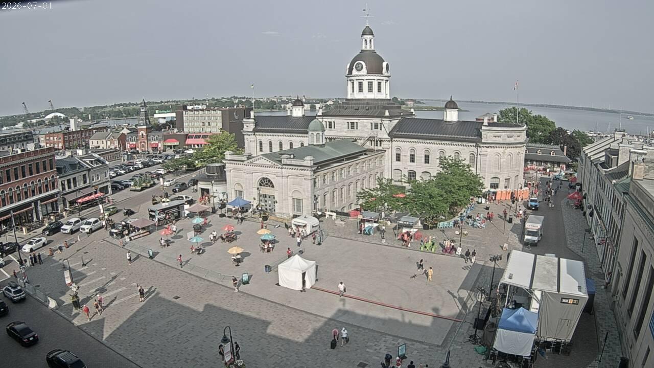 Looking SE from the roof of the British Whig Building looking over King Street, Springer Market Square and City Hall with Lake Ontario in the distance. // Image captured at: 2026-07-01 22:00:02 UTC (about 1 min. prior to this post) // Image sourced from: cityofkingston.ca // Current Temp in Kingston: 81 F | 27 C // Precip: scattered clouds // Wind: SW at 13 mph | 22 kph // Humidity: 78%