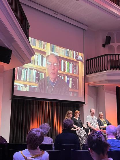 Panel with view of the stream from KSR's library