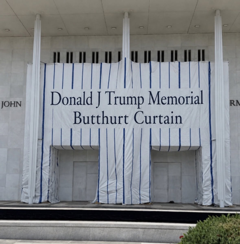Photoshopped image of the curtain covering the Kennedy Center entrance where Donald Trump's name was removed. The curtain now bears the text: "Donald J. Trump Memorial Butthurt Curtain".