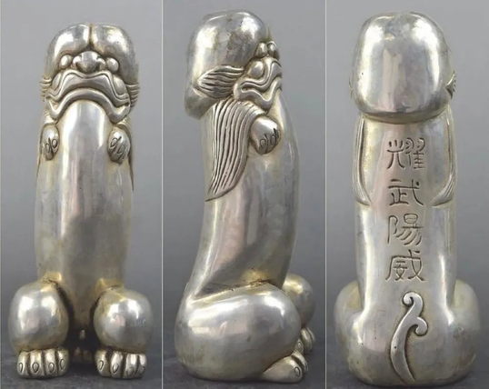 Three photographs of a silver figurine that depicts a lion on its hind legs in an undeniably phallic shape. The feet are positioned like the testes, the front legs as small and tiny as that of a T. rex, and the head has the same shape as the head of a phallus.