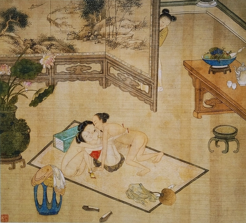 18th century Chinese Shunga painting on silk depicting two ladies with exposed vulvas and a gentleman with an erection. One of the ladies is completely naked and holds the other lady in her arms, who still has a red breast band or top on but is also naked below that. The lady in red has her legs lifted and spread for a man with an erection approaching her. They are watched by a person peeking from behind a paper wall.
