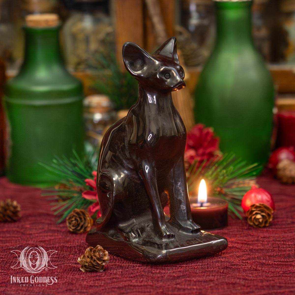A photo of the "Bast Cat Obsidian Statue" product from Inked Goddess Creations.