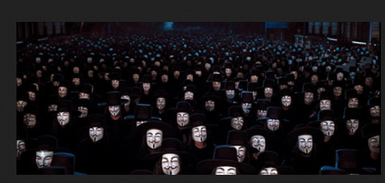 Dark image of a crowd of people all wearing Guy Fawkes disguises.  I believe this came from the 'V for Vengeance' movie.