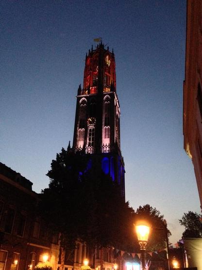 The Dom Tower illuminated in red, white and blue