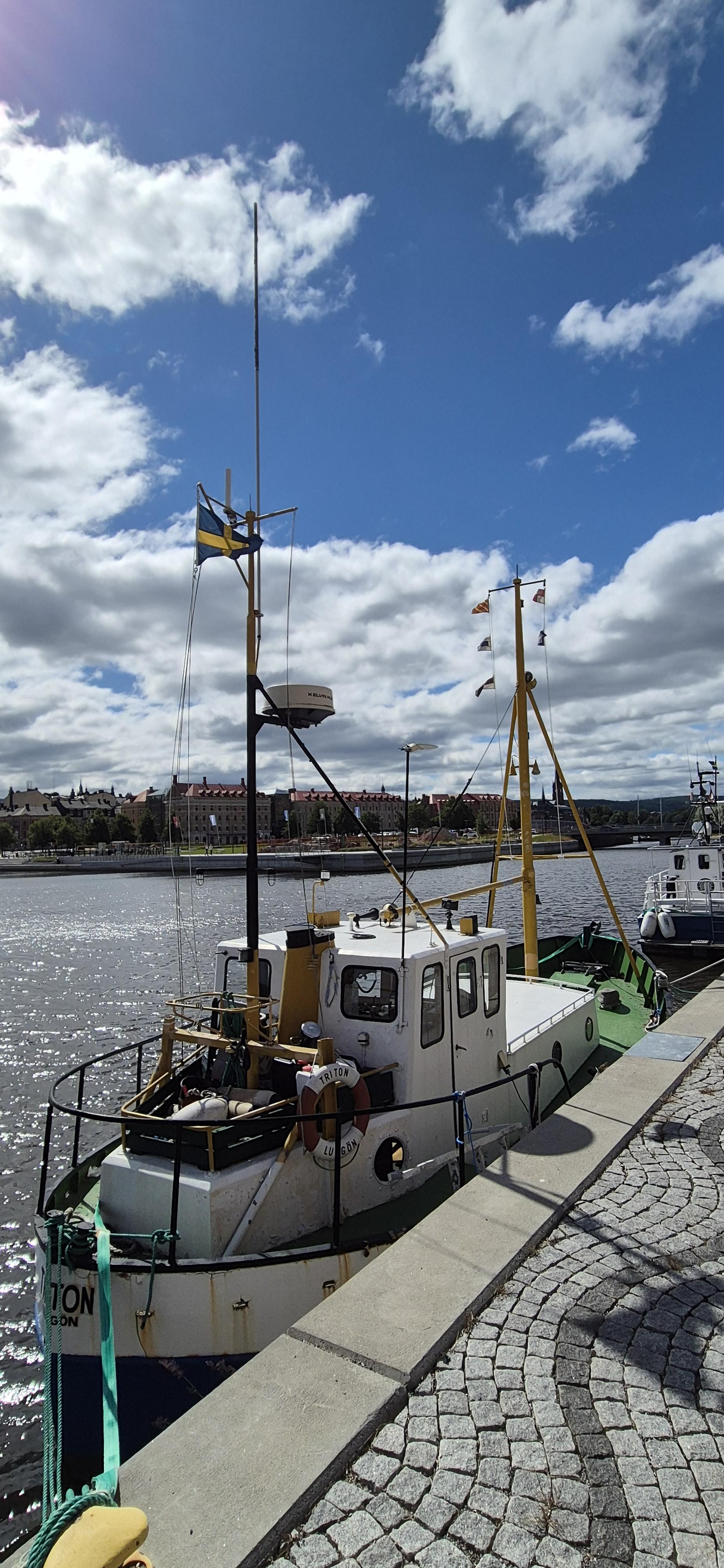 Small boats moored, Sundsvall in the background.