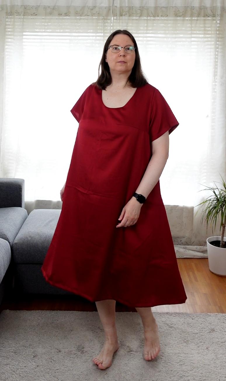 Woman in a red A-Line dress with short sleeves