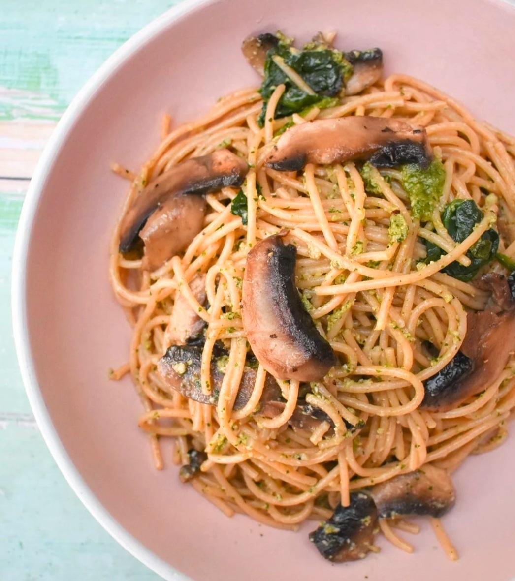 Spaghetti coated in garlicky mushrooms homemade pesto & wilted spinach.