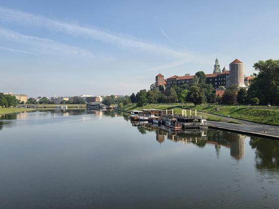 The Wawel caste reflecting across the Vistula river. 