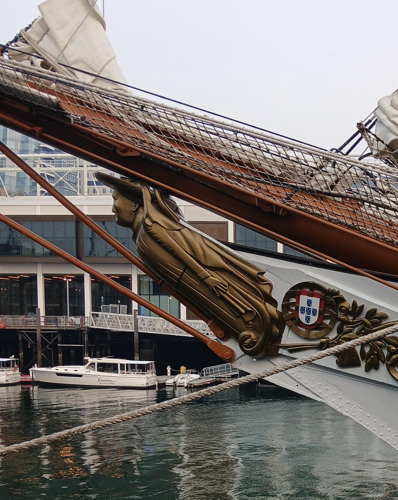 Figurehead of Portuguese tall ship Sagres, a bronze-colored man.