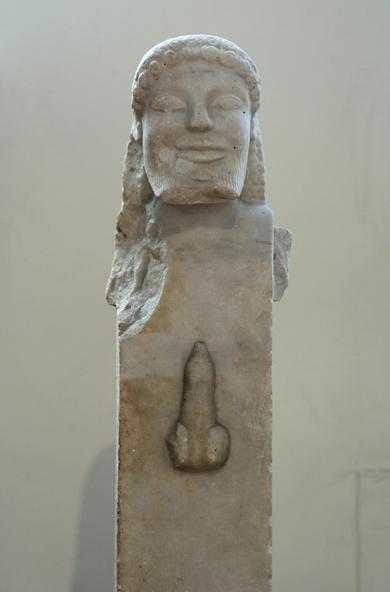 Marble Herm of Hermes from Sifnos, dated circa 520 BCE. A herm is a stone pillar with a head, in this case a head of Hermes, and a phallus at the appropriate height. The phallus is erect and fully covered by its foreskin. Today in the National Archaeological Museum of Athens.