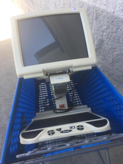 The ClearView 500. It’s a big CRT attached to a movable platform, with a camera pointing at the platform and several buttons on the front. It’s beige, because of course it is.