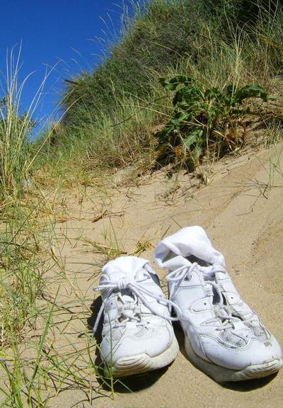 My dirty white running shoes, many summers ago, kicked off in the sand dunes of Gullane in East Lothian, Scotland. Brilliant blue sky. What a day that was!