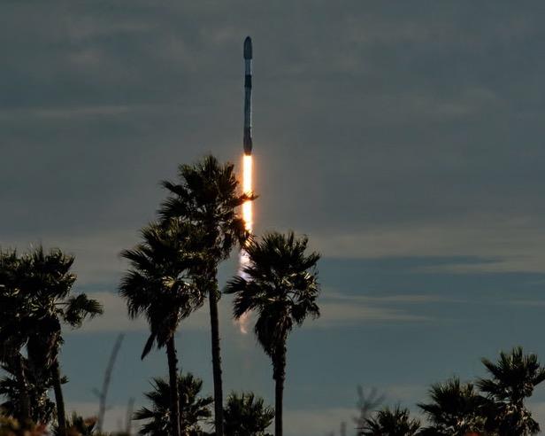 Rocket lifting off into the sky