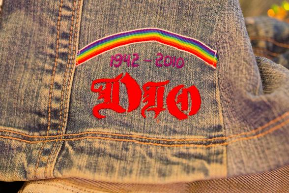 Commemorative Patch for Ronnie James Dio 1942-2010 with a rainbow over it on a denim jacket