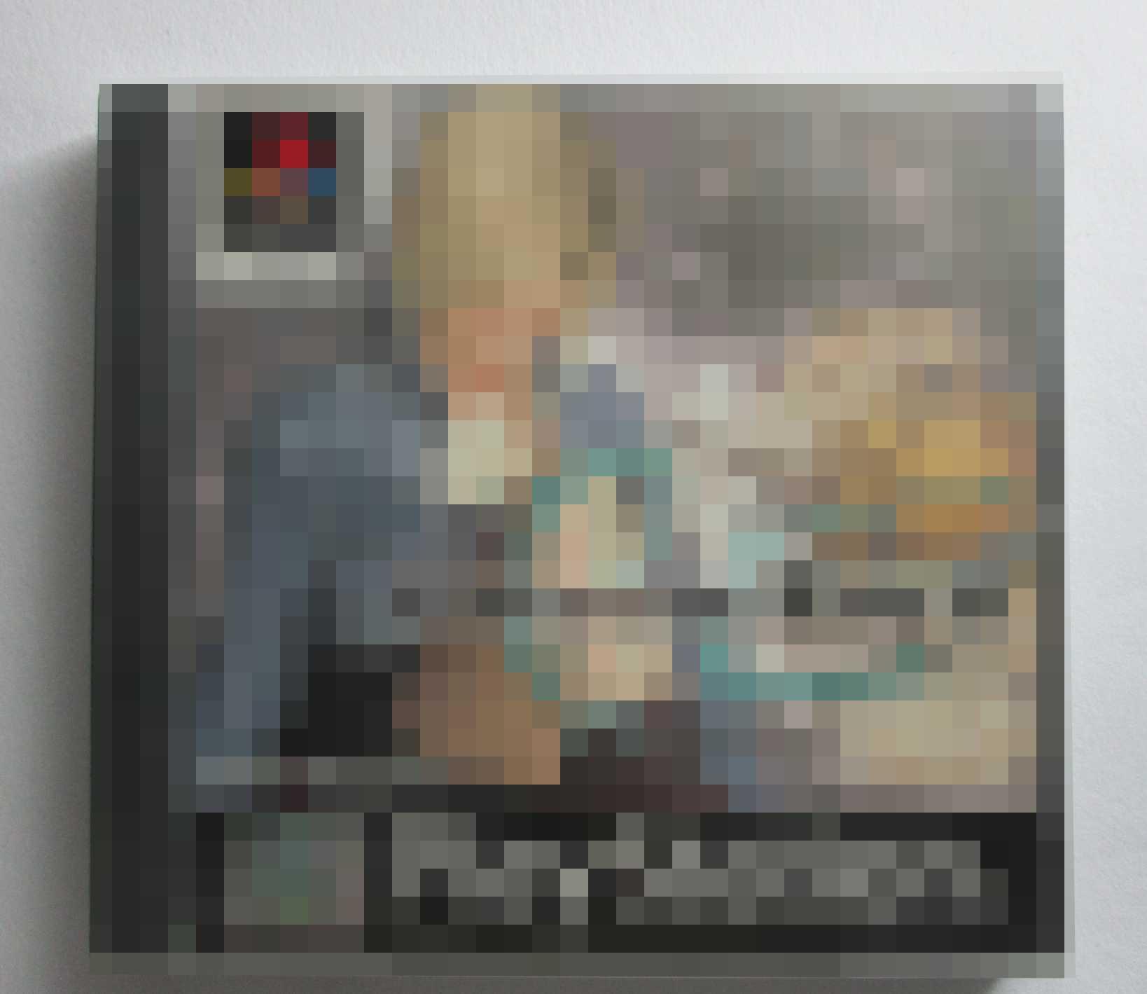 Square game case with a fully pixelated cover.