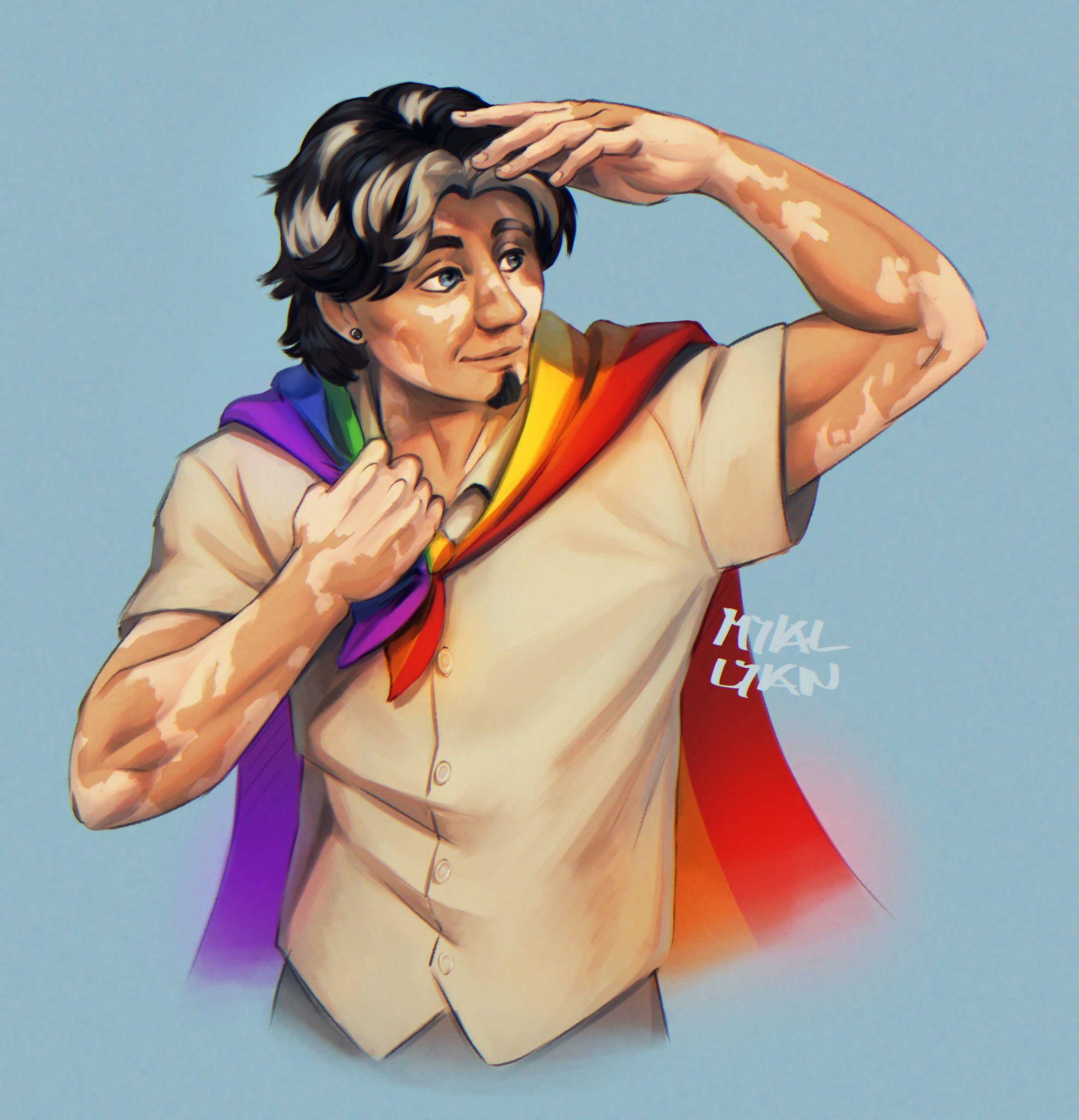 Man with vitiligo looking at something off camera. He's wearing a white short sleeved dress shirt, and a cape out of a pride flag. He's holding is hand up to cover his eyes from the sun