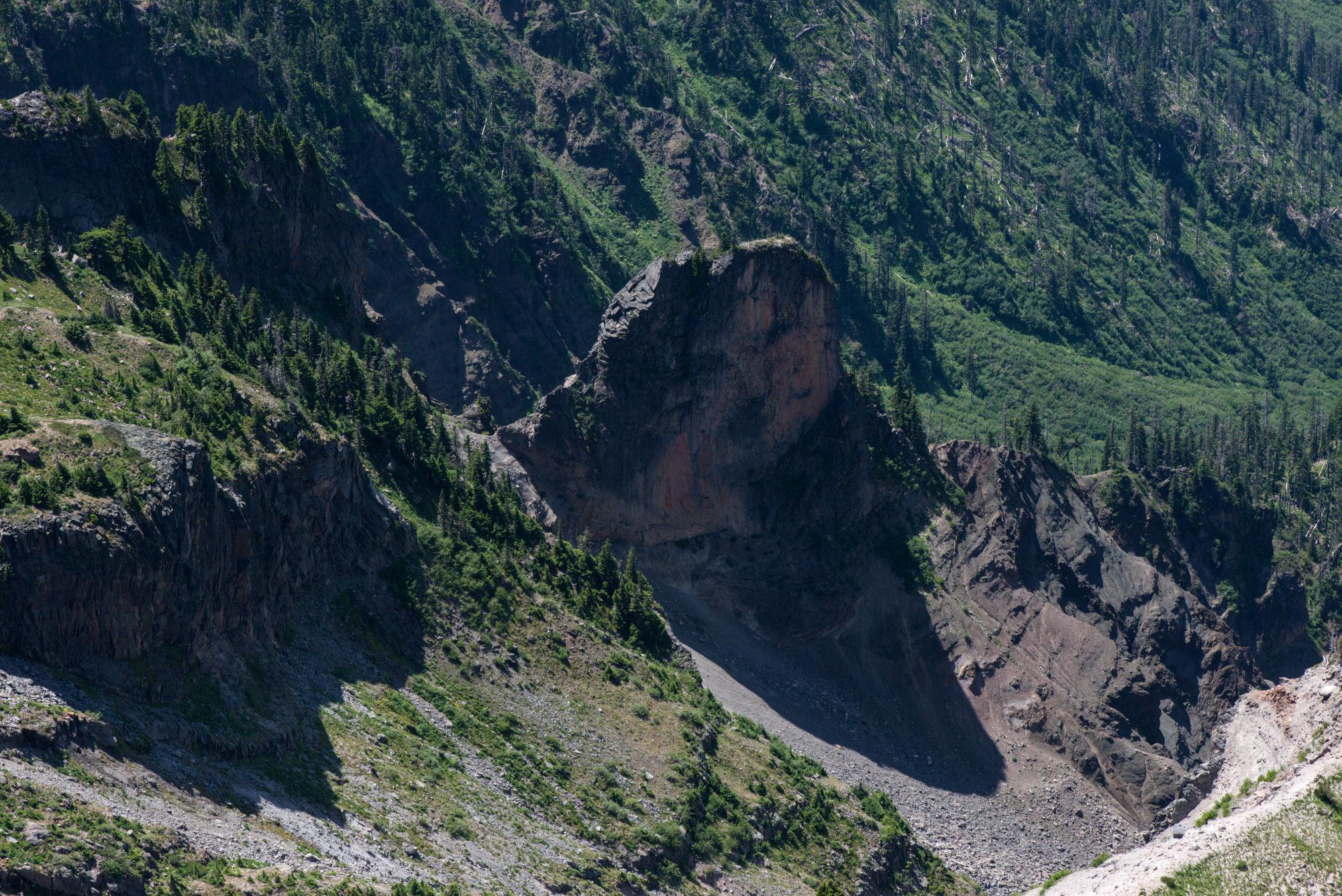 Looking down at what looks like a giant rock fin sticking up out of a ridge.