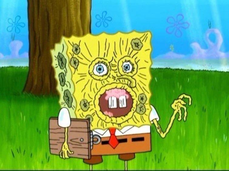 A character resembling a cartoon sponge, with exaggerated facial features and a distorted expression, stands in a grassy area. The character wears a tie and holds a wooden box, displaying a shocked or distressed demeanor. A tree and blue sky with stylized flowers