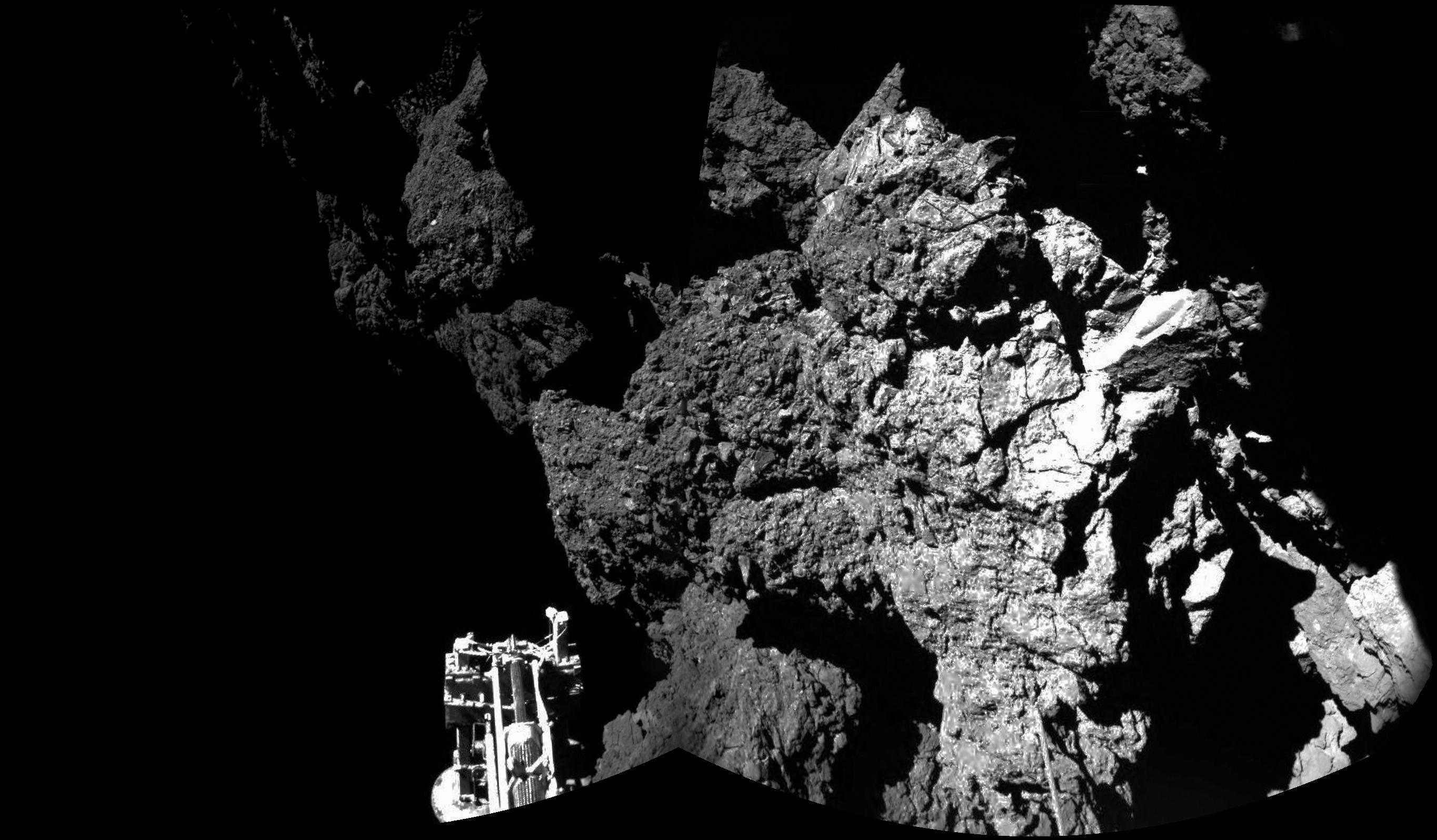 The Philae lander of the European Space Agency Rosetta mission is safely on the surface of Comet 67P/Churyumov-Gerasimenko, as these first two images from the lander CIVA camera confirm. One of the lander three feet can be seen in the foreground.