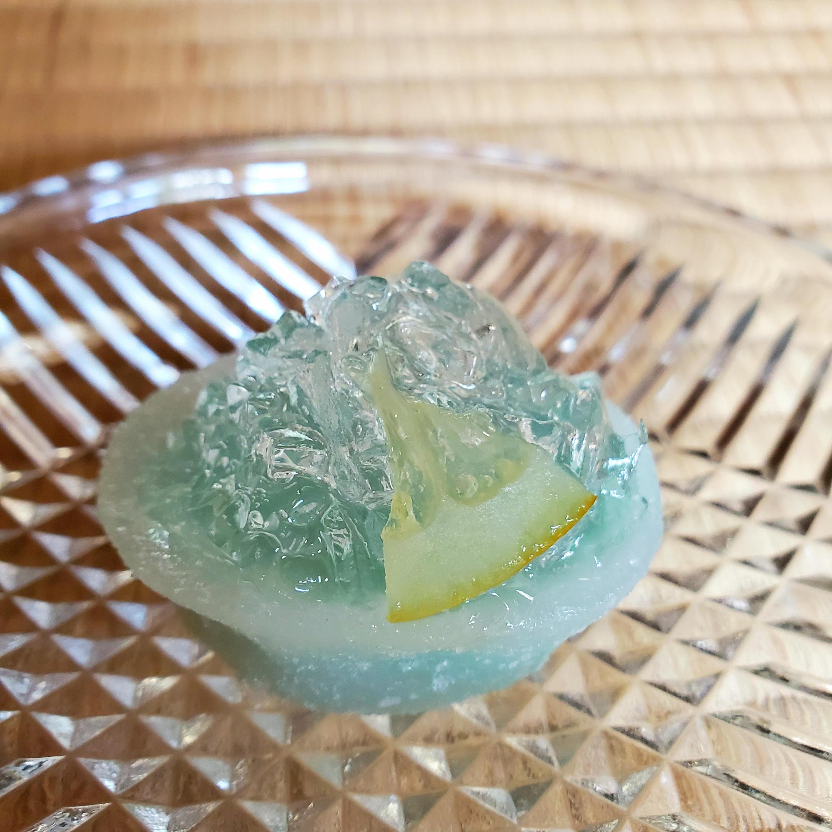 Kameyama Yoshinaga 'noryo', a blue jelly like sweet with slice of lemon.