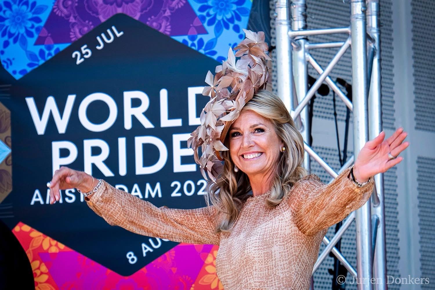 Queen Maxima in front of the main stage backdrop announcing World Pride Day, Amsterdam 2026.