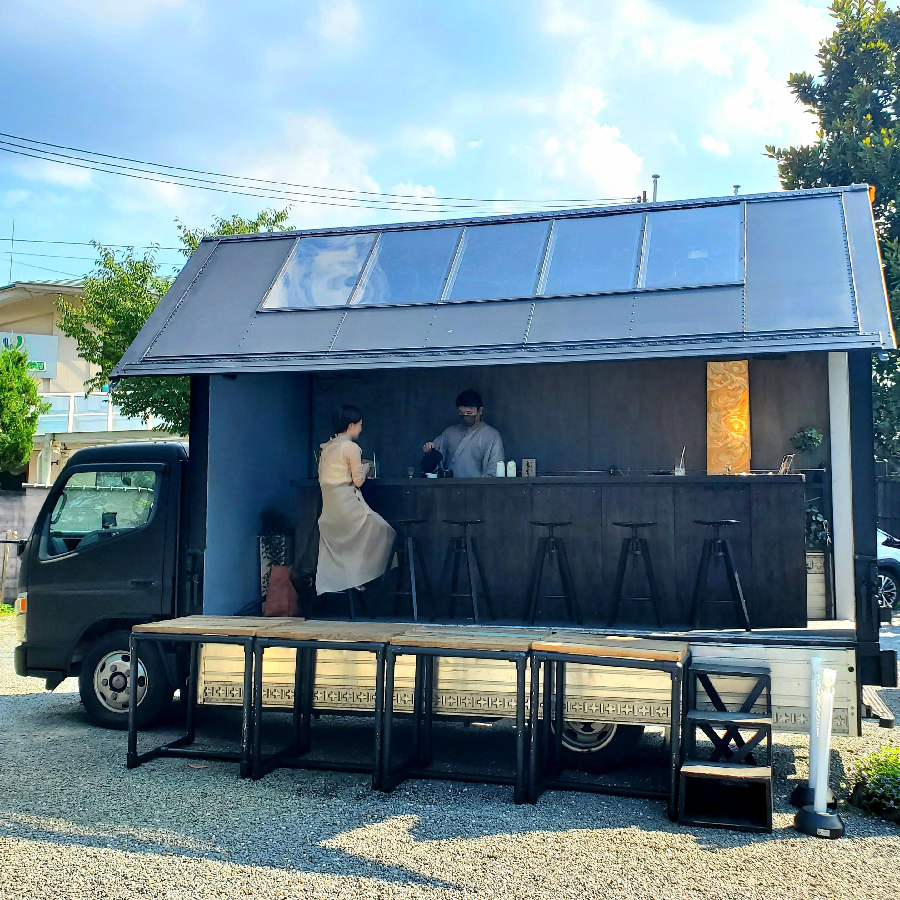 'TEA SALON TANK', a mobile-café run by 'TANK'.