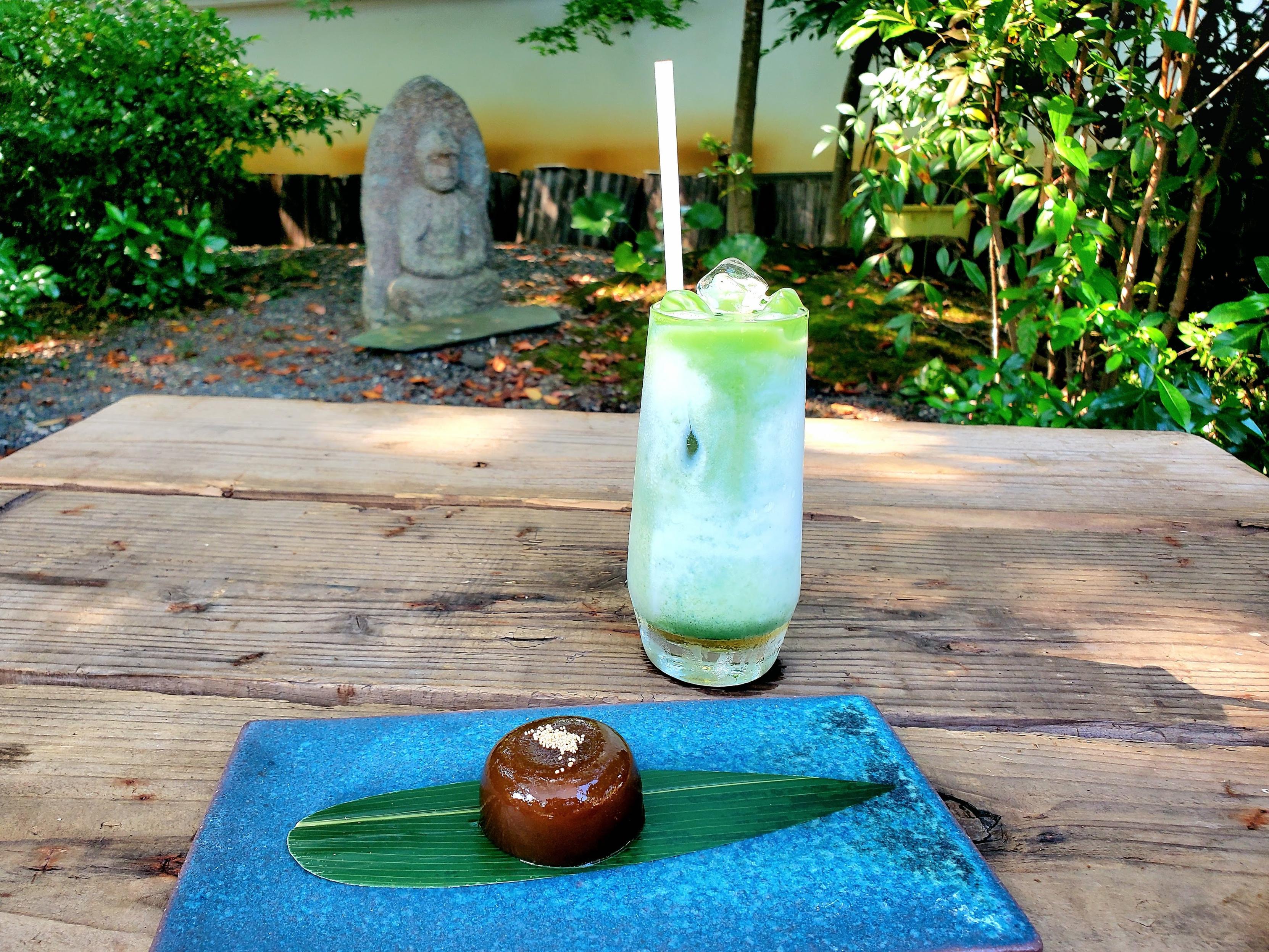 Iced matcha latte and ubatama sweet (a ball of red bean paste and muscovado sugar covered in agar jelly).