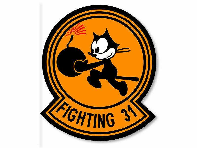 The emblem and mascot of the US Navy Strike Fighter Squadron 31, are the famous cartoon character Felix the Cat, running with a large spherical black bomb with a lit fuse.