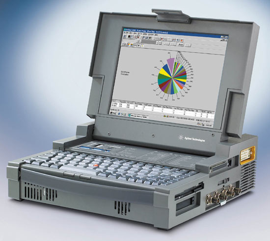 Hardened computer in a thick portable case. It's a computer network protocol analyzer.

Described by it's maker:
"Token-Ring, T-1 bantam, DDS, ISDN, V.35, RS232, and RS449 interfaces. You can access this protocol analyzer as if you were in front of it by using VNC either from your computer over the VPN or from the WIN2KSRV server. You can run traces on WAN and LAN segments separately or simultaneously to follow your packets from LAN to WAN media, generate traffic and monitor/analyze VOIP calls. The stand alone Advisor is connected to several LAN and WAN segments in the lab network so you can trace traffic on both WAN and LAN segments simultaneously."