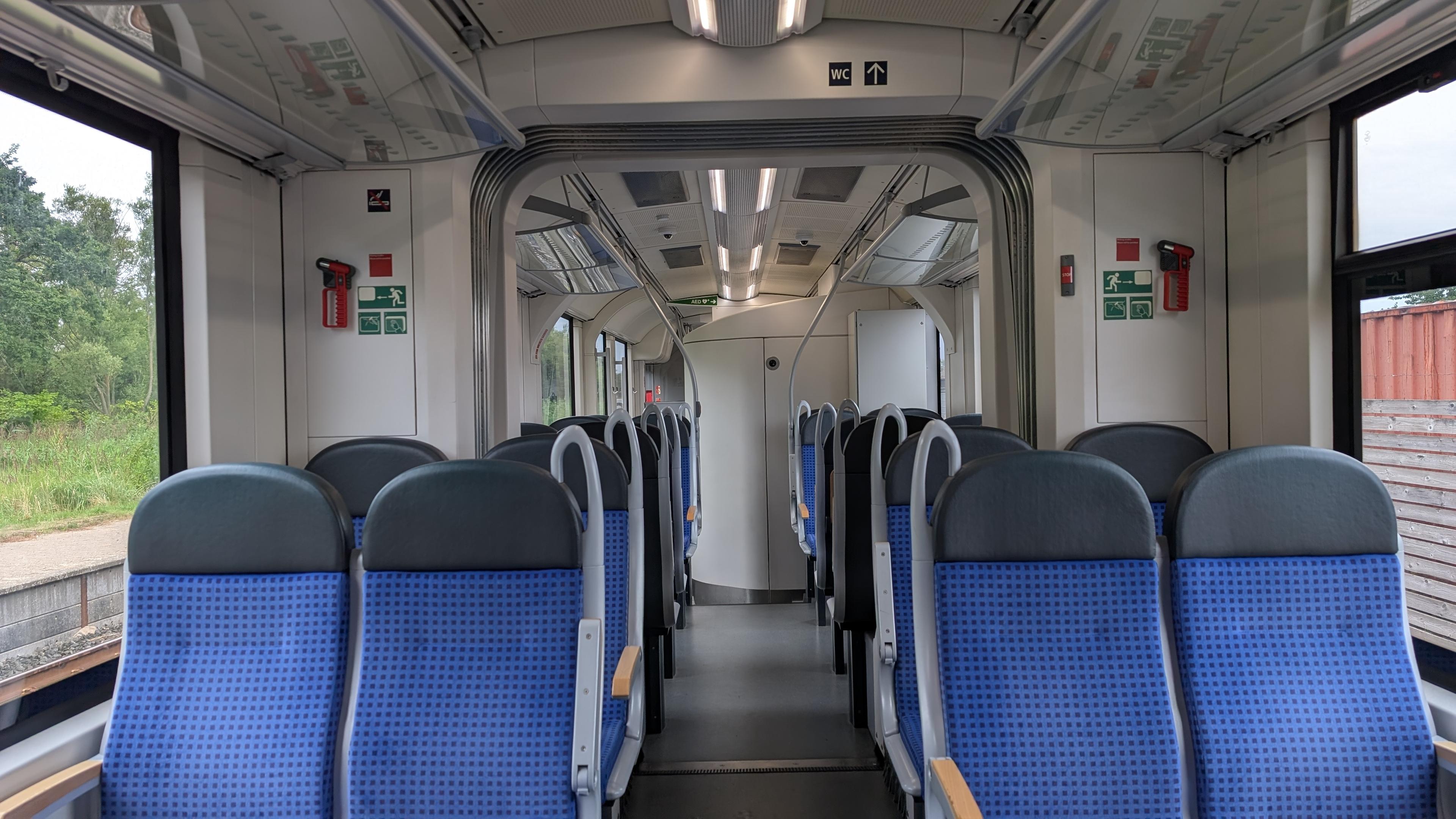 Empty train, 2+2 seating, blue padding, grey head parte