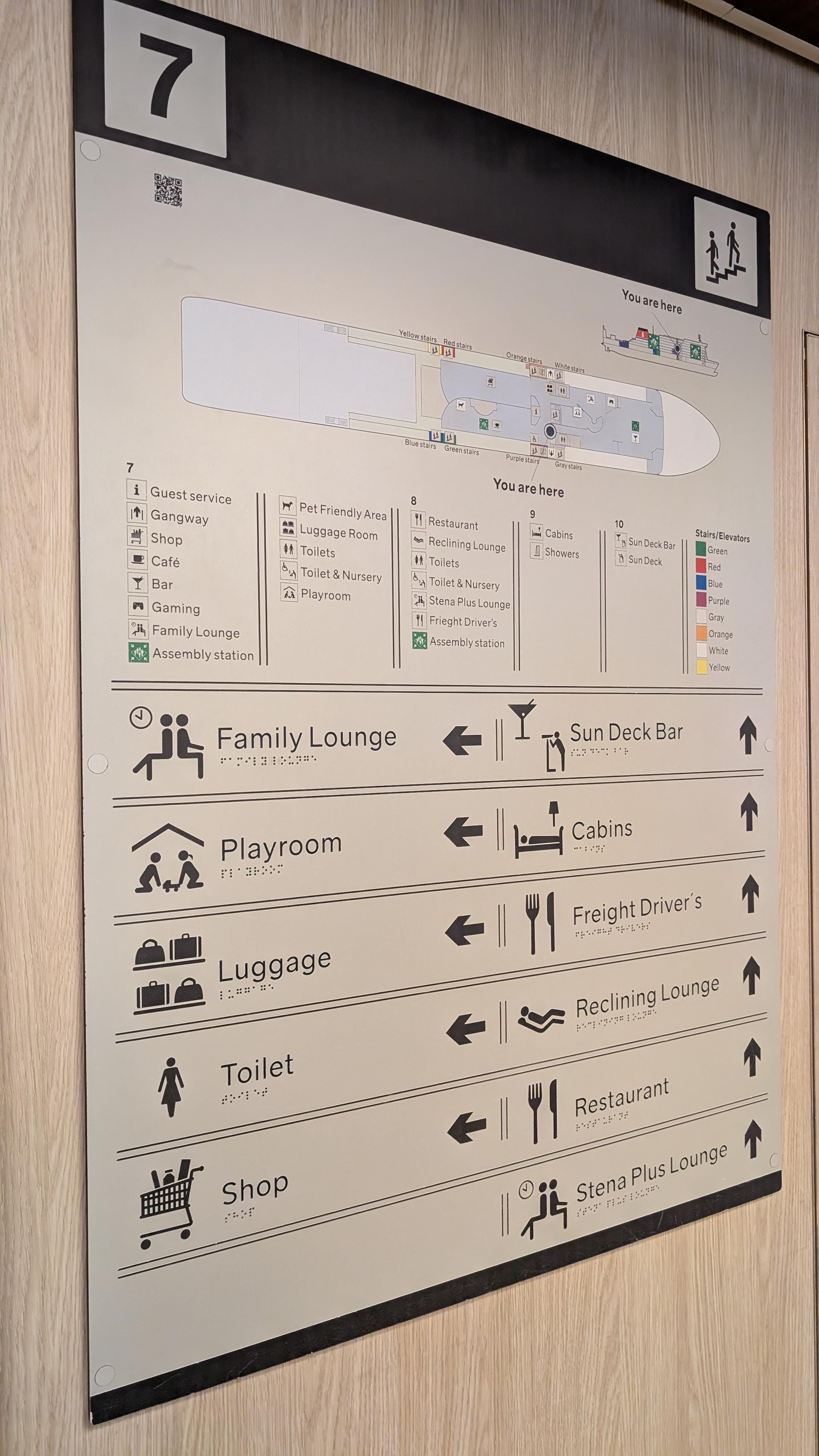 Silver panel with directions (Symbols, Braille, arrows): Family Lounge, Sun Deck Bar, Playroom, Cabins, Luggage, Freight Driver's, Toilet, Reclining Seats, Shop, Restaurant, Stena Plus Lounge