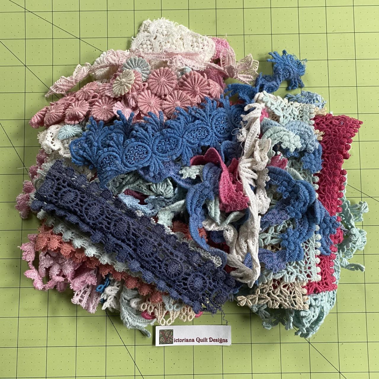 Pile of pink & blue cotton laces.