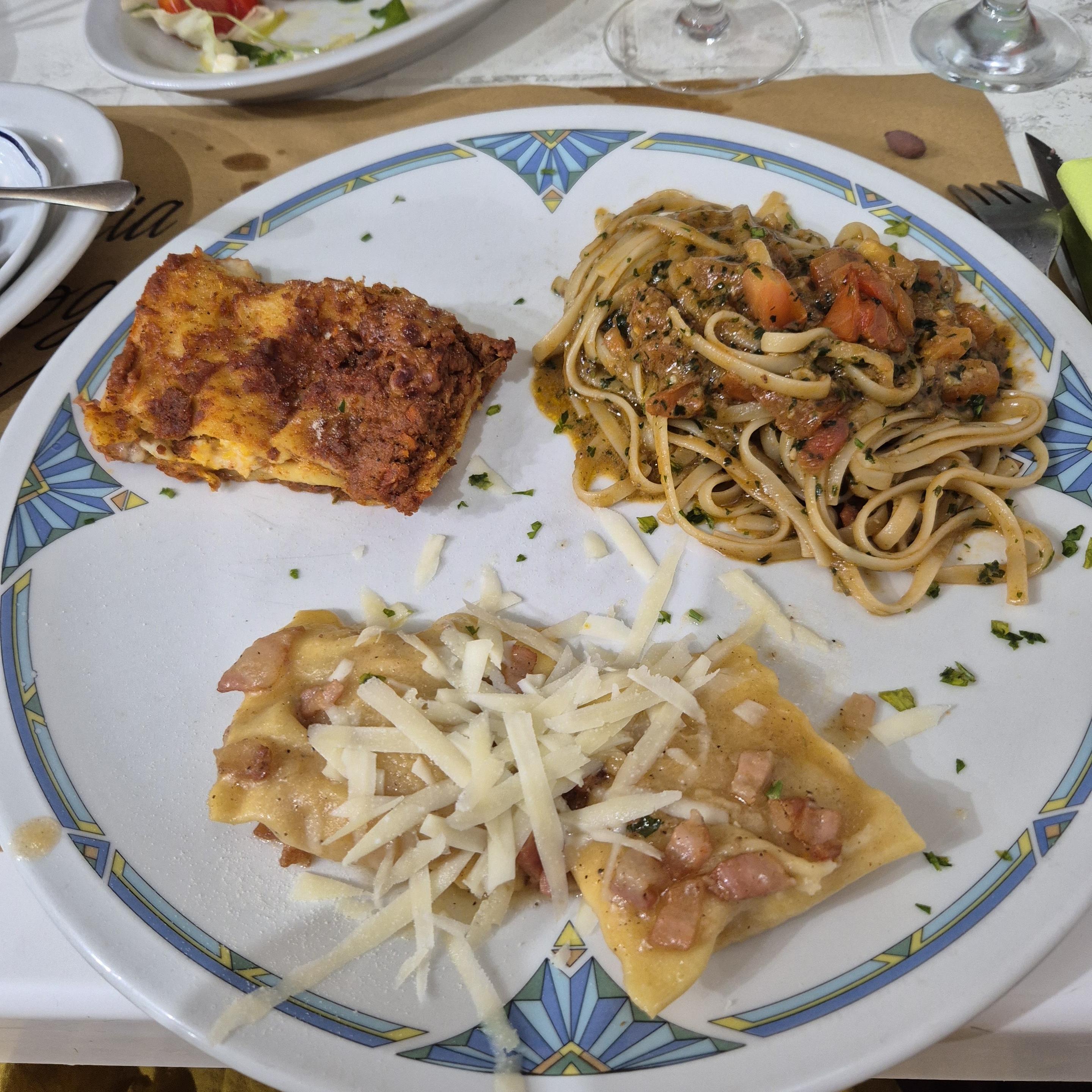 Plate with three different types of pasta.