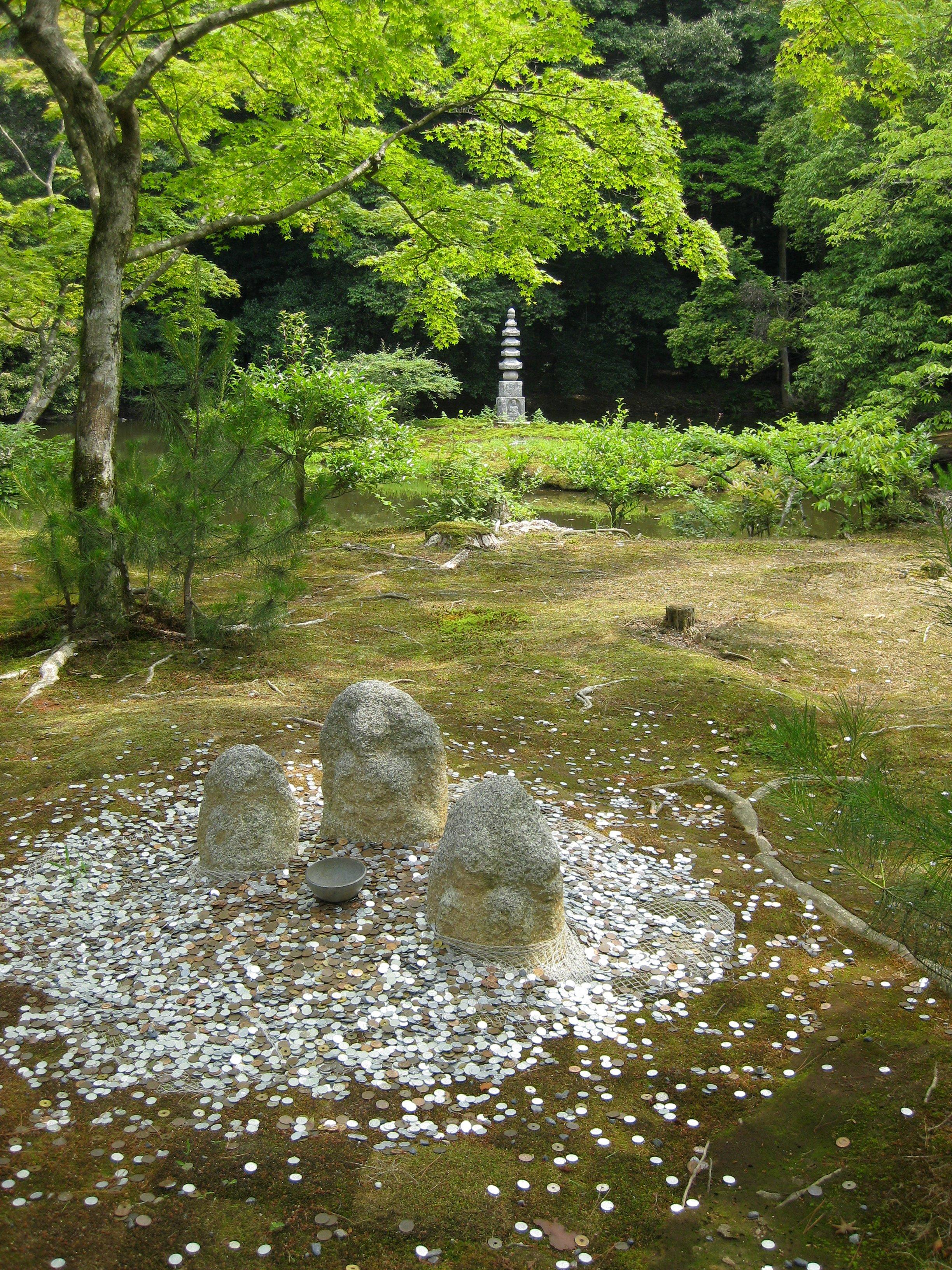Kinkaku-ji's 'Anmintaku' (安民沢 'Tranquility Pond') and 'Hakuja-no-Tsuka' (白蛇の塚 'White Snake Mound') are thought to be where the Saionji Family had their tutelary shrine.