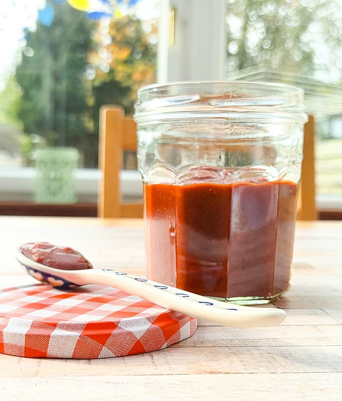 Jar of hot harissa sauce.