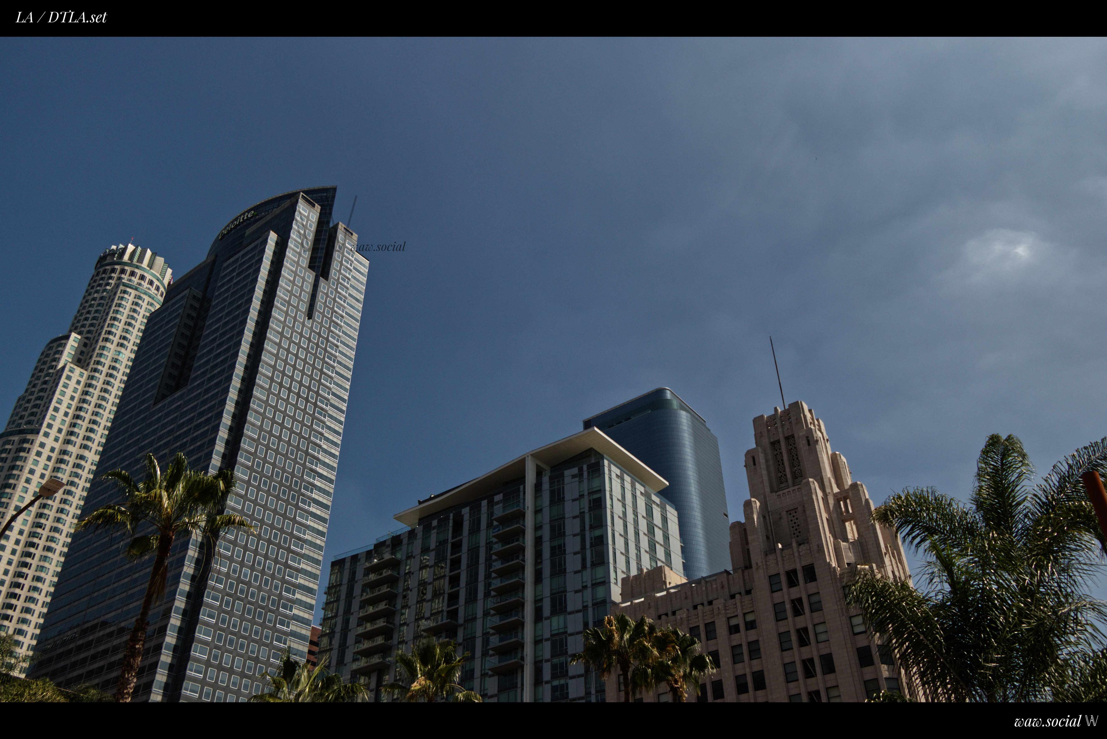 A warm-ish photo of buildings in Downtown Los Angeles with the US Bank Tower and Gas Company Tower in frame.