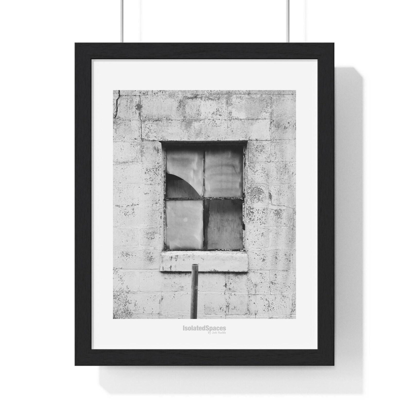 Framed monochrome print of broken window, abandoned building, by Josh Humble.