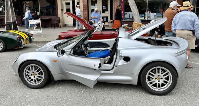 Lotus Elise Series 1 with door and engine cover open.