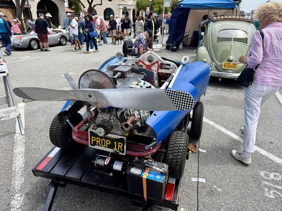 Crazy home made kart based car with a propellor. On a trailer.